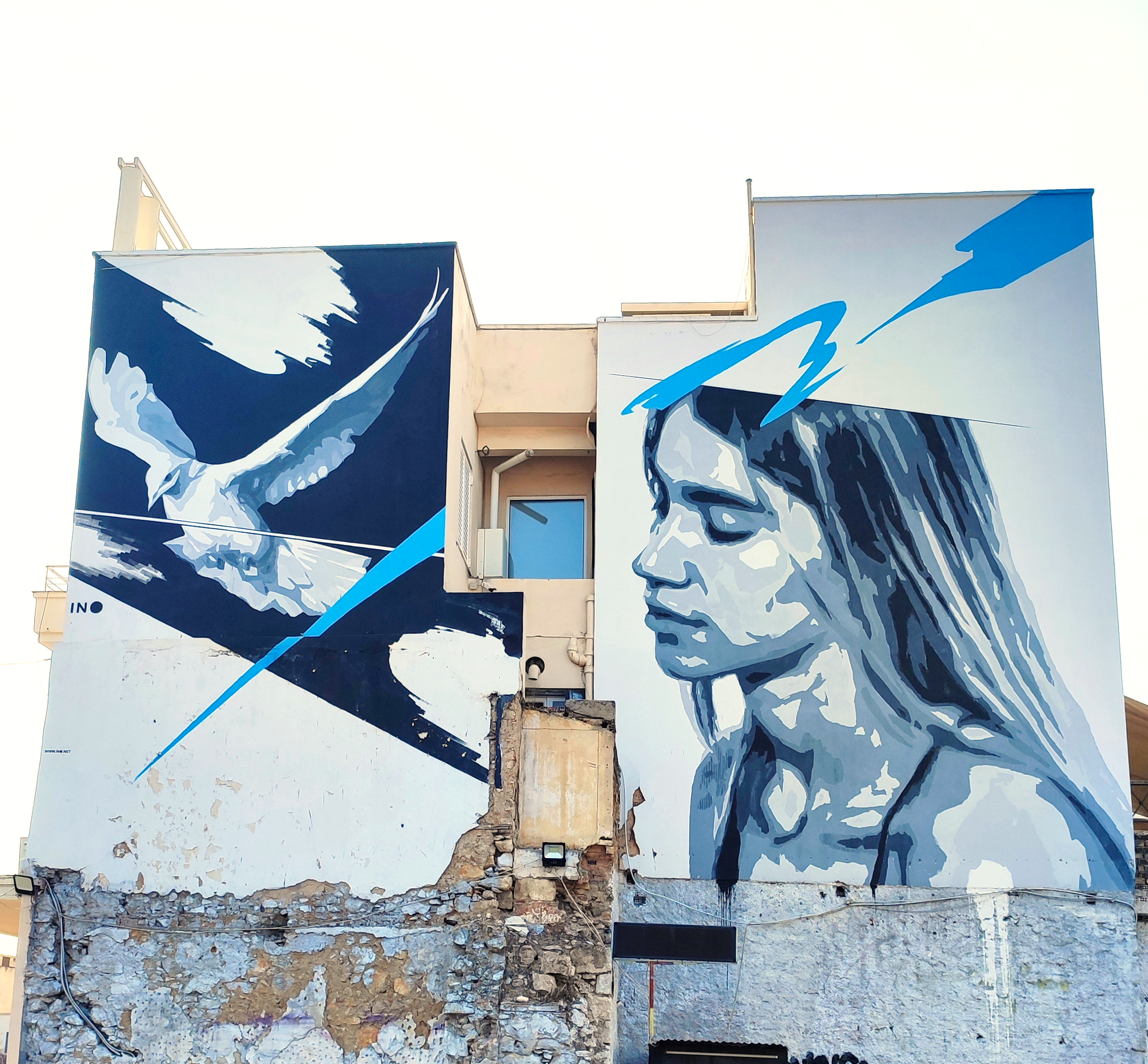 Street Art in Athens. Mural showing a young girl